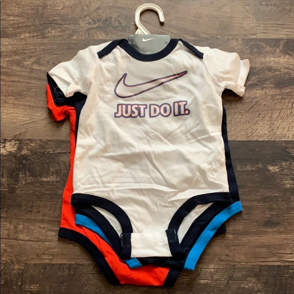 NWT 4 Nike Onesies